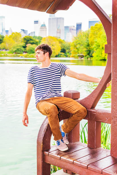 istock Young Man missing you, waiting for you at Central Park, New York 841412764