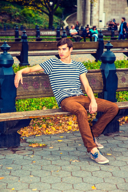 istock Young man relaxing at Central Park, New York 841412820