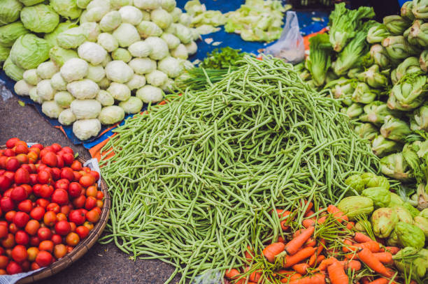 야채는 베트남 시장에서의 다양 한 - lime market vietnam fruit 뉴스 사진 이미지