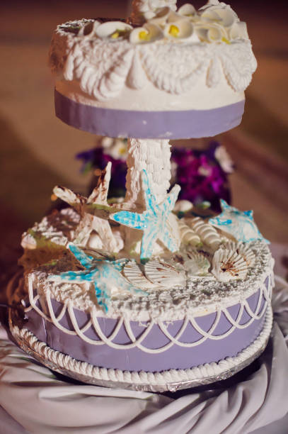 istock Wedding cake on the beach. Wedding in the tropics concept 841413294
