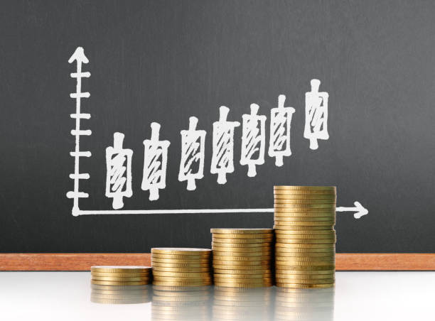 istock Coins graph stock market 841415632