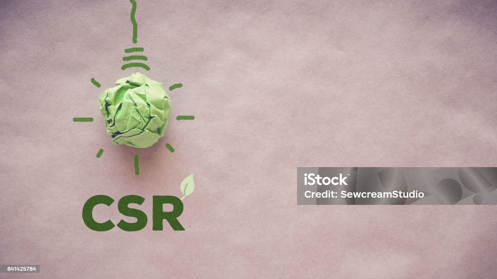 Green paper light bulb with CSR, Corporate social responsibility Responsible Business Stock Photo