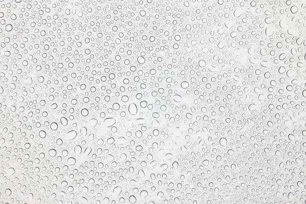istock Water drops on glass, Rain droplets on glass background. 841433854