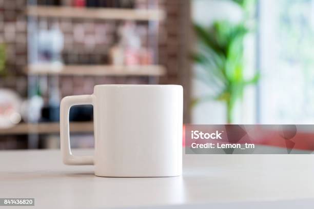 White Mug In Morning Time At Office Room Background Blank Drink Cup For Your Design Square Shape Stock Photo - Download Image Now
