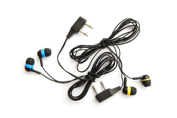 istock Disposable airline earphones isolated on white background 841436986