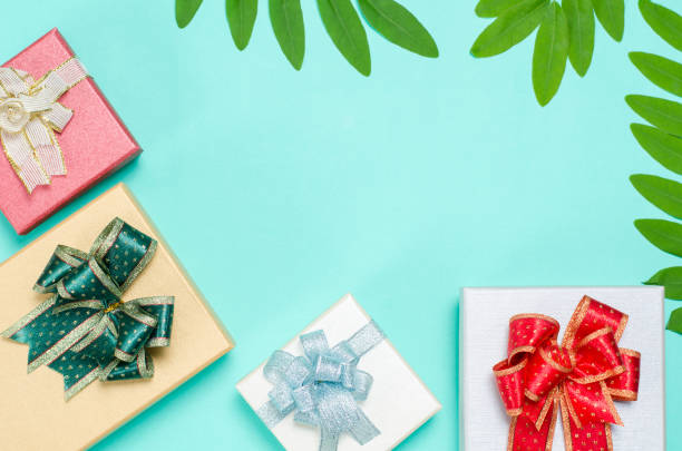 istock Colorful gift box decoration with green leaf 841437116