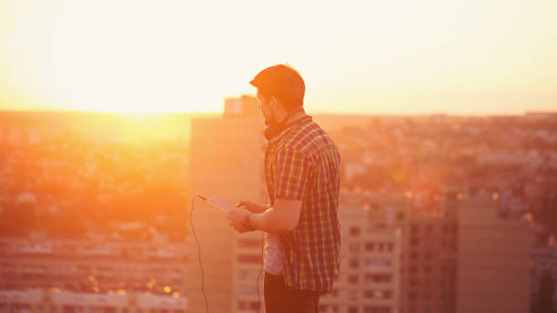istock Man listens to music 841437222