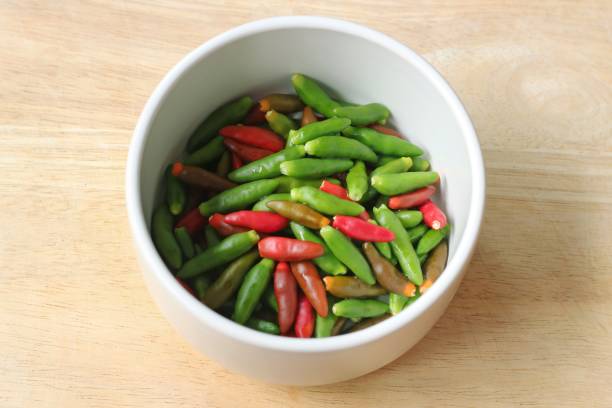 istock chili peppers in white bowl 841441336