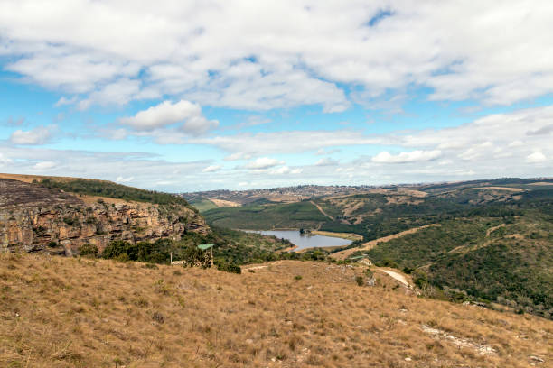 istock Winter VegetationHhills Valleys and Dam Against  Cloudy Sky 841445134
