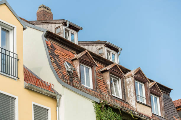 istock Modern clapboard house with chimney and roof light 841452556