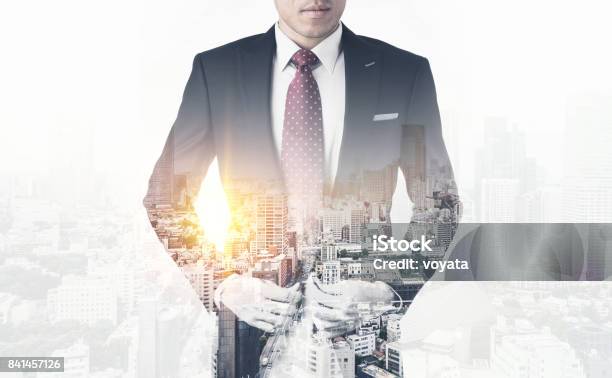 Modern Office Man With Dark Suit Double Exposure Effect With Japan City Skyline Background Stock Photo - Download Image Now