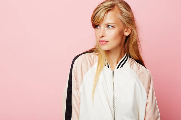 istock Looking away varsity girl 841466046