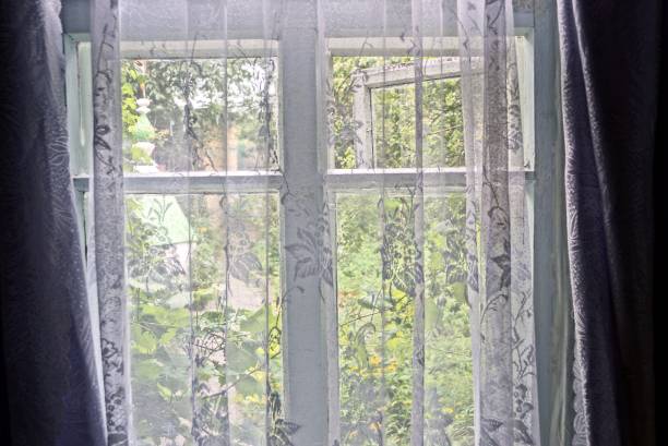istock the window in the room is covered with a transparent curtain 841466356