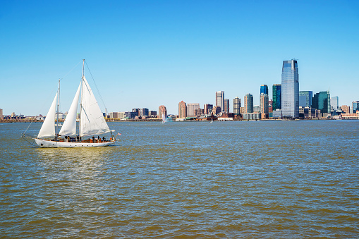 New York, USA - April 26, 2015: View of New York City Manhattan skyline over Hudson River. Manhattan is central part of New York, USA. It is one of leading cultural and economic centers in world