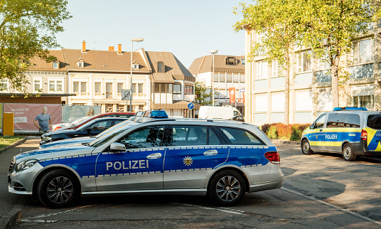 Kehl: Modern Polizei Police car Mercedes-Benz blue car parked in front of Police Station in center of the city of Kehl, Germany