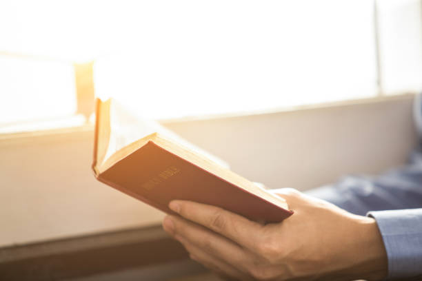 istock A man reading the Holy Bible. 841482264