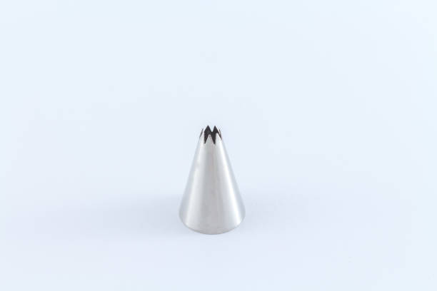 istock Pastry Icing Tip End Nozzle for icing top of pastry cake or pie isolated on white background 841486440