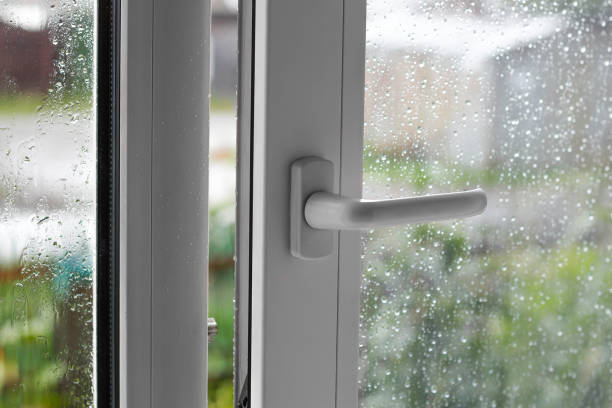 istock Open white plastic window. In the rainy weather. Closeup 841486902