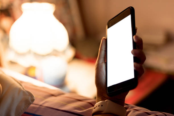 istock Asian women are using the smart phone on the bed before she slee 841490290