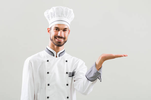 istock Chef showing palm of hand 841494010