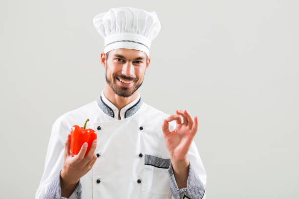 istock Chef  showing ok sign and pepper 841494586