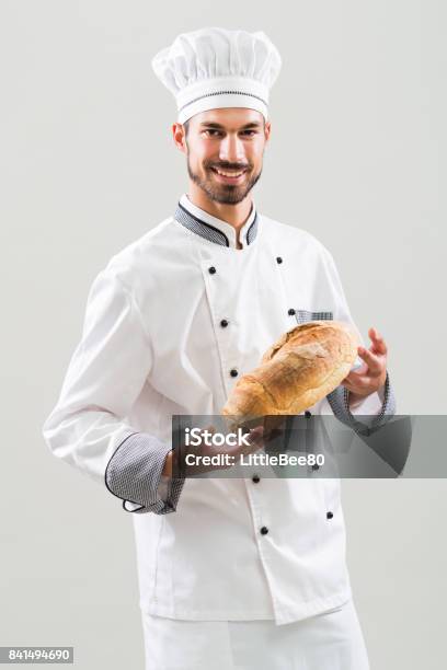 Brot Bäcker Holding Stockfoto und mehr Bilder von Brotlaib - Brotlaib, Brotsorte, Bäcker