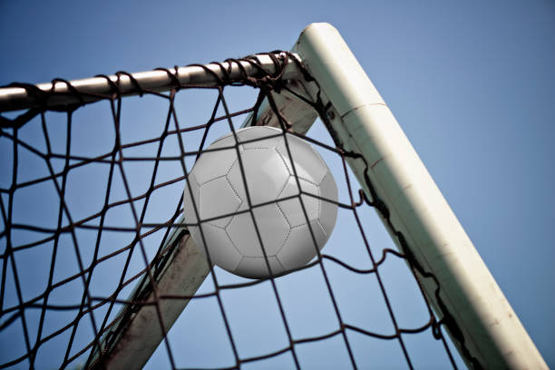 istock Soccerball in net ready for championship 841495464