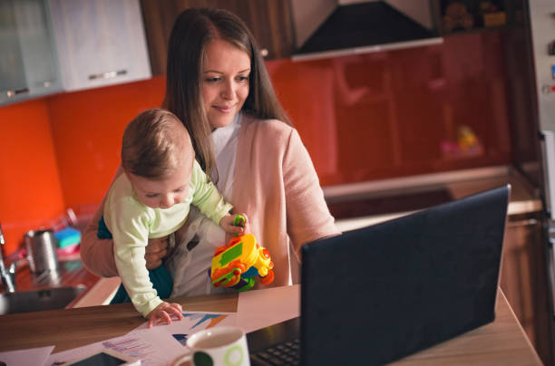 istock Modern mother balancing work and family 841499502