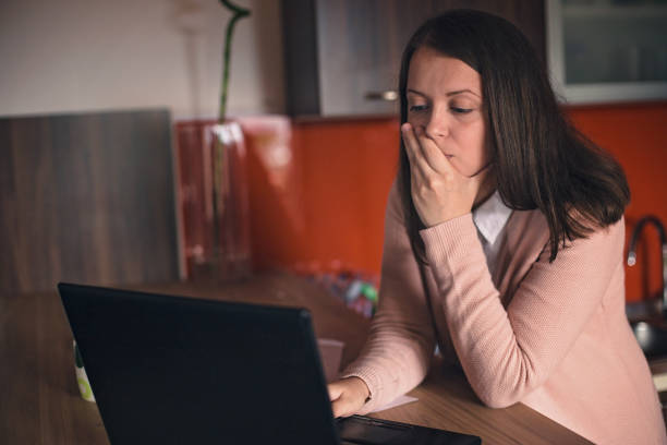 istock Young businesswoman working at home 841502244