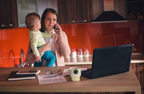 istock Single woman balancing work and family 841502326