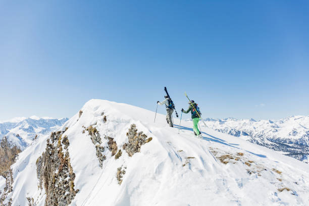 istock Climbing up mountain for backcountry skiing 841506000