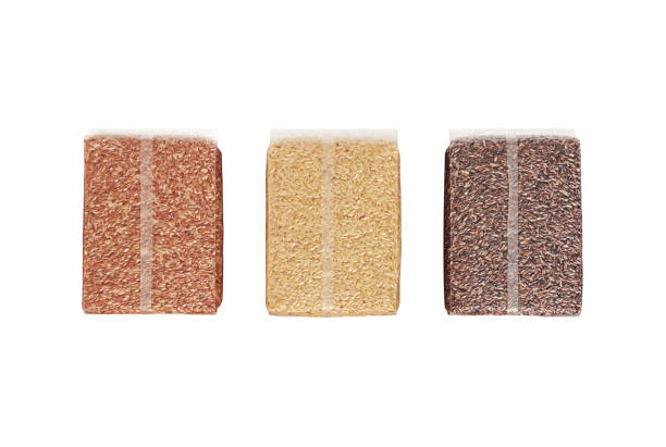 Red Jasmine Rice, Jasmine Brown Rice and Riceberry in Plastic Clear Bag Isolated on White Background, Clipping Path
