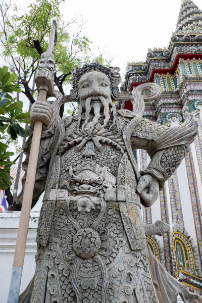 istock ancient stucco chinese doll in thai temple 841518034