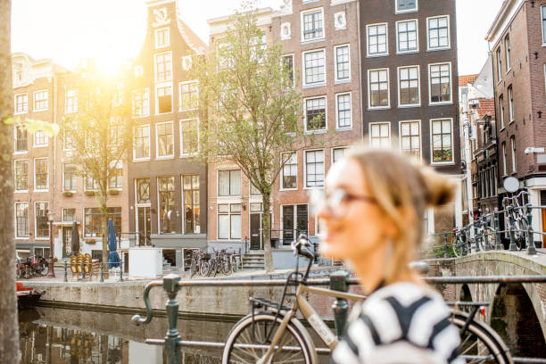 istock Woman walking in Amsterdam city 841519458