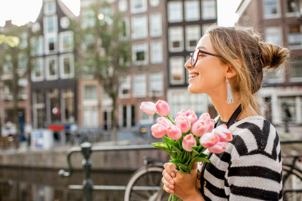 istock Woman walking in Amsterdam city 841519498