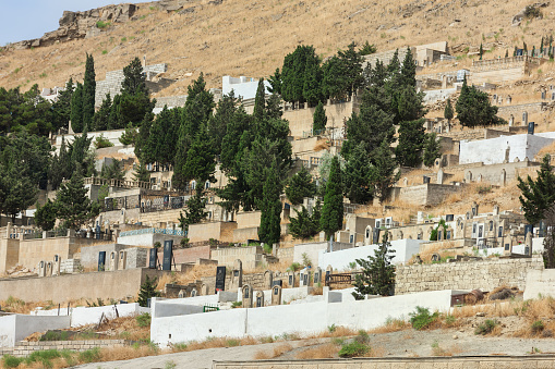 Old Azerbaijani cemetery in front of Bibheybat Mescidi central mosque near Baku on the mountain of Shikh village