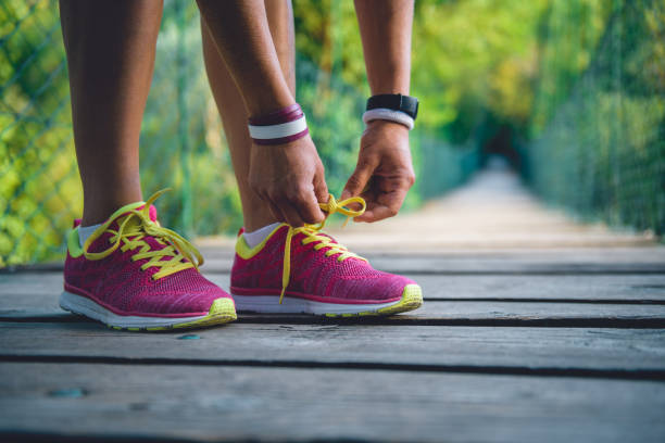 istock Tying sports shoes 841531550