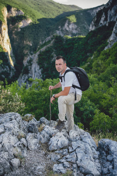 istock Hiker standing on the mountain top 841533864