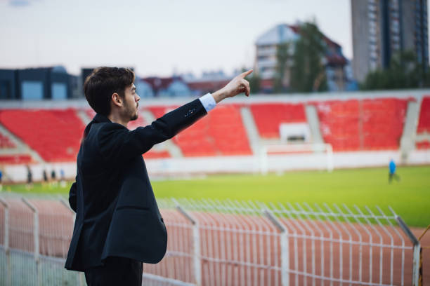 istock Man on stadium grandstand 841535020