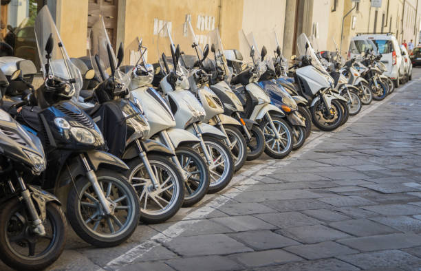 istock Row of parked mopeds 841535194