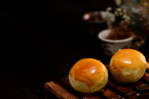 istock yolk pastry(Egg yolk shortcake) on wooden table isolated on black   backgrond 841535620