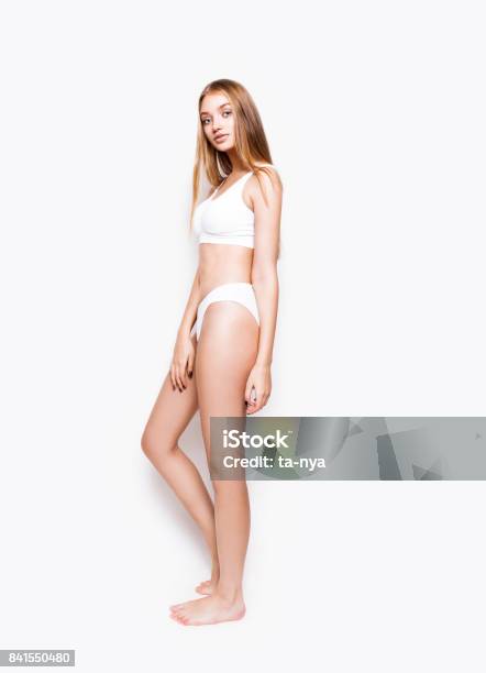 Elegant Asian Girl Posing In White Underwear Isolated On White