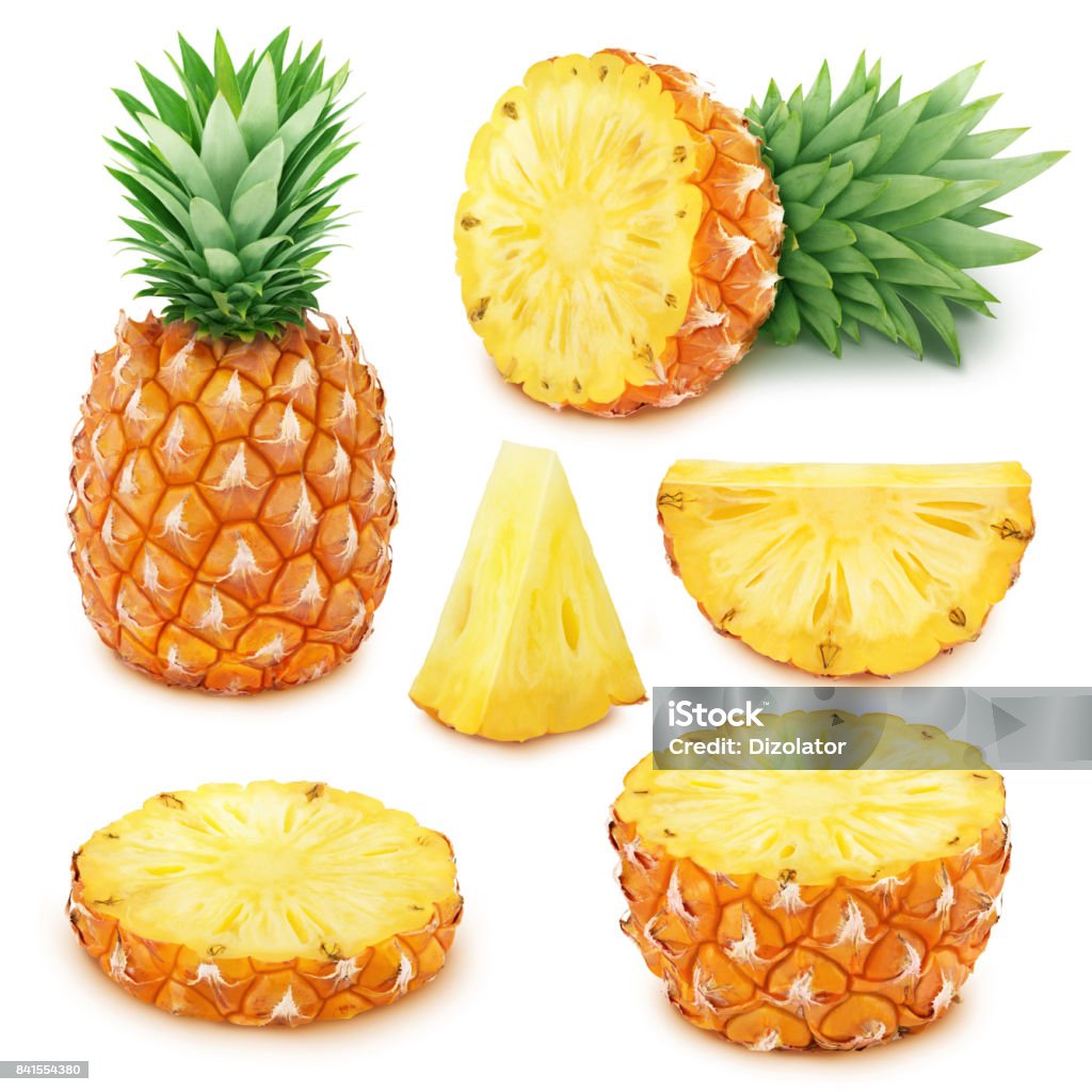 Pineapple set: whole and sliced pineapples. Pineapple set: whole and sliced pineapples isolated on a white background. Pineapple Stock Photo