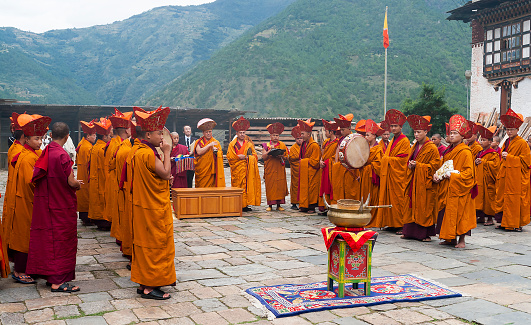 Monk ritual in Trashigang dzong, Bhutan. Ceremony take place in the courtyard.