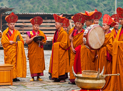 Monk ritual in Trashigang dzong, Bhutan. Ceremony take place in the courtyard.