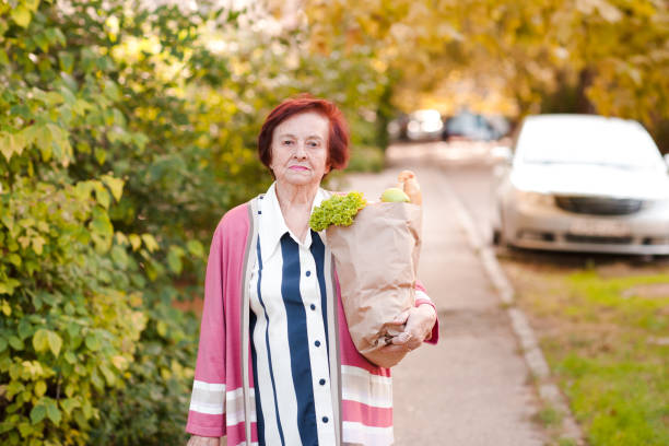 istock Old woman shopping 841554878