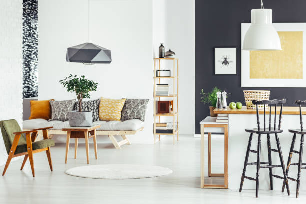 Multifunctional interior with green chair
