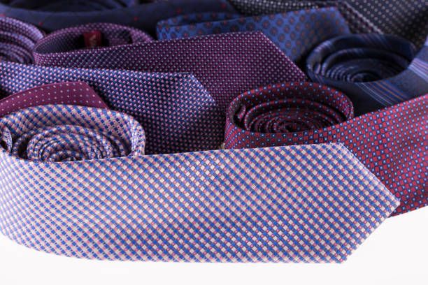 istock Beautiful silk ties are stacked together. 841573182