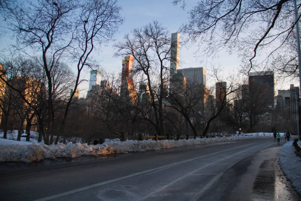 istock Road and snow at Central Park before sunset 841573330