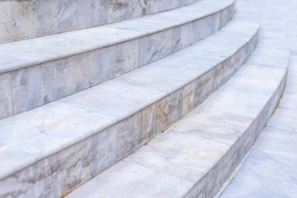 istock Selective focus of white curve marble stairs, rounded step, architecture concept of exterior buildings. Background and texture usage. 841588668